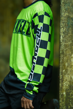Load image into Gallery viewer, Green Vortex motorcycle riding jersey side view showing checkered sleeve graphics and breathable green mesh fabric