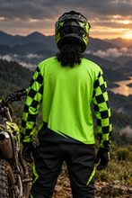 Load image into Gallery viewer, Green Vortex Men's Riding Jersey back view featuring vibrant green and black checkered sleeves and a clean black back design, worn by a motorcycle rider.