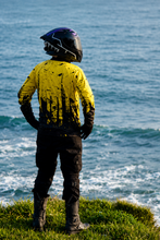 Load image into Gallery viewer, Neon Impact Men's Riding Jersey worn during an adventure motorcycle ride with high-visibility neon yellow styling