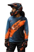 Load and play video in Gallery viewer, Flare Force Men's Riding Jersey in navy blue, orange and grey with bold racing graphics, designed for KTM riders and off-road motorcycle enthusiasts.