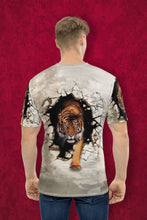 Load image into Gallery viewer, Person wearing a t-shirt with a tiger design on a cream background
