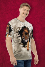 Load image into Gallery viewer, Man wearing a t-shirt with a tiger design on a cream background

