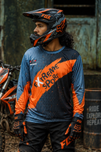 Load image into Gallery viewer, Flare Force Men's Riding Jersey in orange, black and grey with bold racing graphics, designed for KTM motorcycle riders
