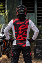 Load image into Gallery viewer, Sandstorm Elite Men's Riding Jersey back view featuring bold red and black camouflage graphics with contrasting sand-coloured sleeves.
