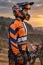 Load image into Gallery viewer, Voltage Vector Men's Riding Jersey front three-quarter view in vibrant KTM-compatible orange and navy colours, designed for motorcycle riders, MX, adventure touring and street riding.
